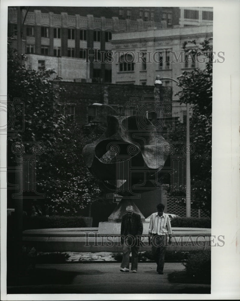 1978 Two Men Walk Around Art Fountain In Cathedral Square Park - Historic Images
