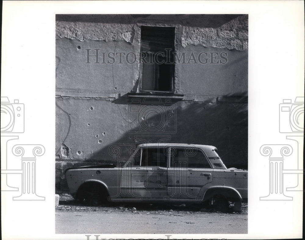 1993 Press Photo Sniper Target: Bullet riddled car are a common sight in Mostar - Historic Images