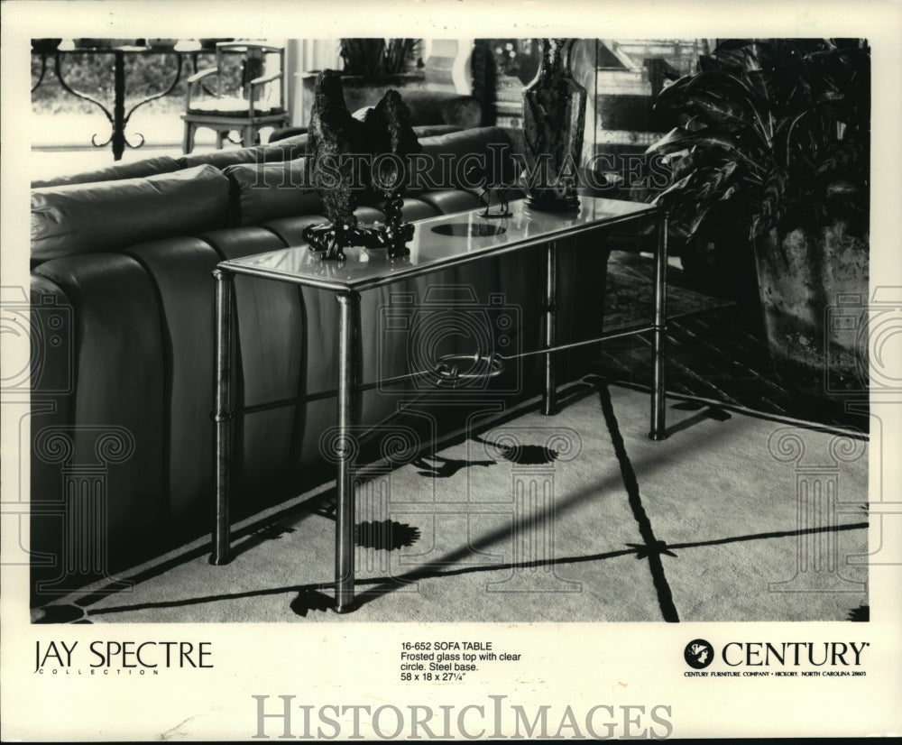 1987 Press Photo Spectre&#39;s sofa table has frosted glass top and steel base-Historic Images