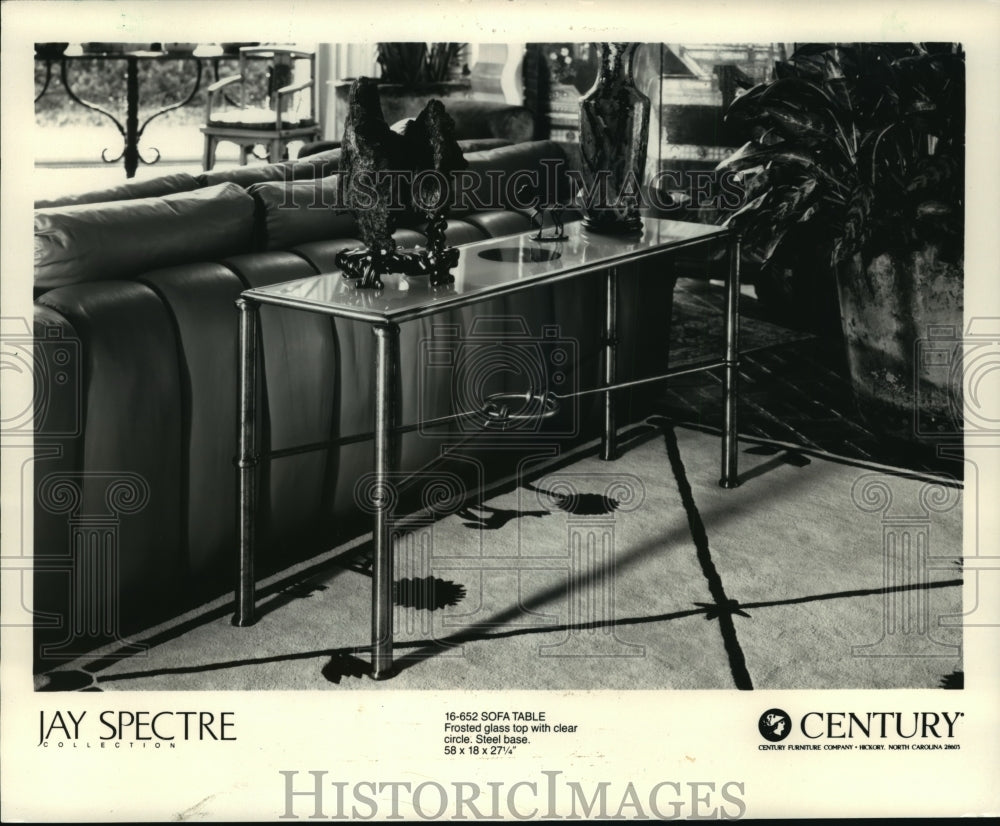 1987 Press Photo Spectre's sofa table has frosted glass top and steel base-Historic Images