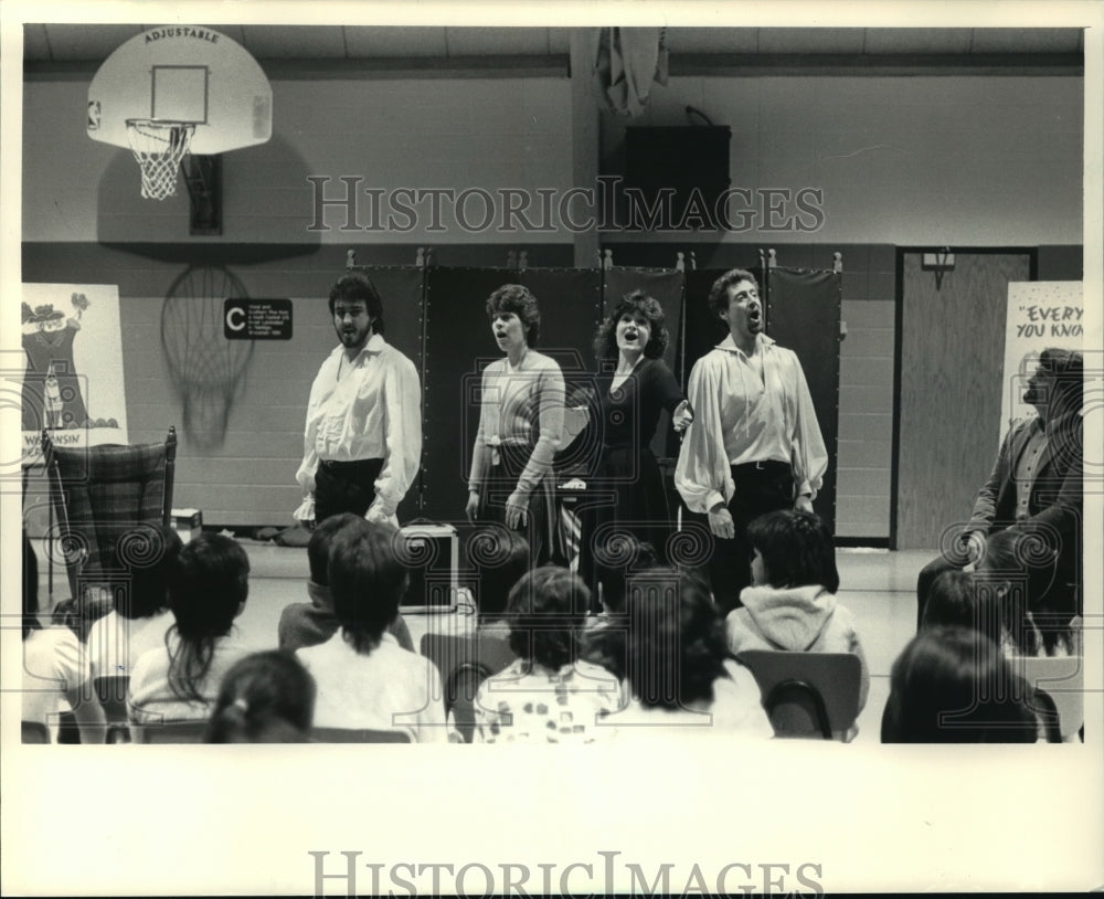 1987 Press Photo Members of The Wisconsin Opera Theater Performing at a School-Historic Images