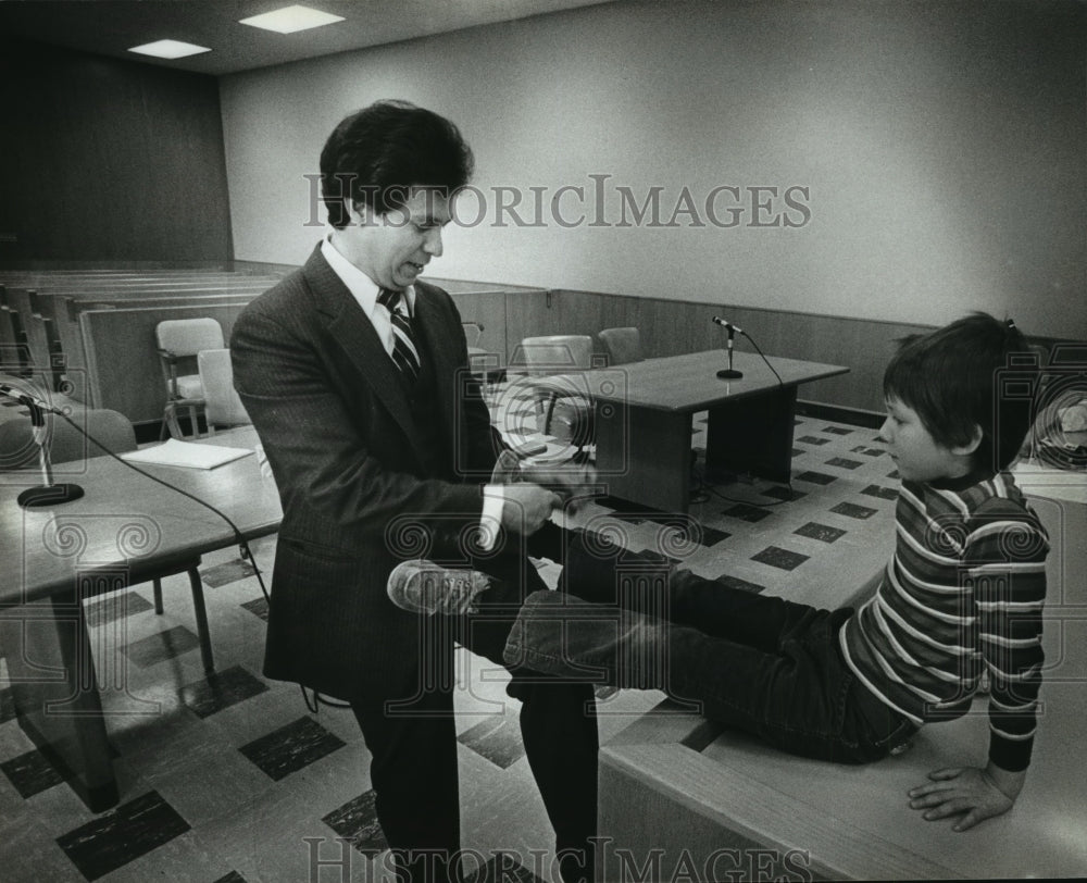 1983 Francisco M. Camacho Ties his Son&#39;s Shoe-Historic Images