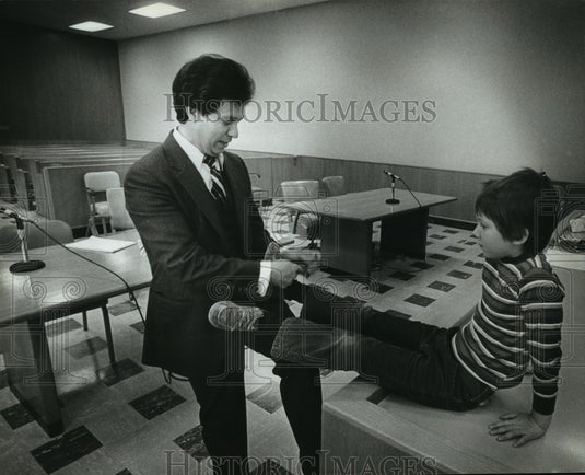 1983 Francisco M. Camacho Ties his Son's Shoe-Historic Images