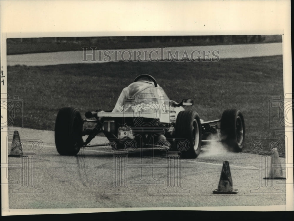 1985 Press Photo Student Driver Slides off the Track - mja58731-Historic Images