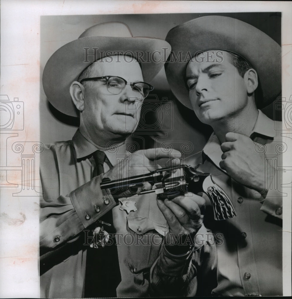 1956 Press Photo Sheriff Jack Howard shows TV Sheriff John Bromfield some tricks- Historic Images