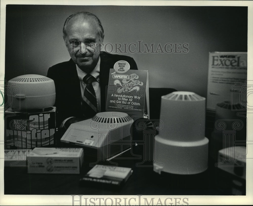 1948 Vaportek Inc.President, John D. Bryson with his products. - Historic Images