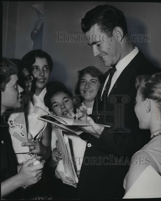 1954 Press Photo Joe Adcock, signs autographs at St. Rose's Orphan Asylum-Historic Images