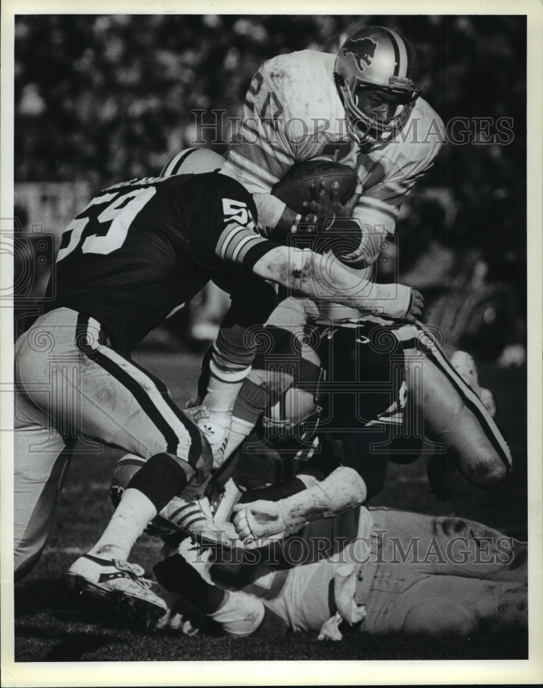 1982 Press Photo John Anderson Stopping a Run Play During Football Game- Historic Images
