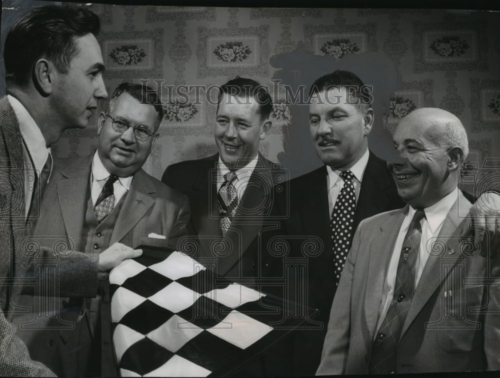 1954 Press Photo Tom Marchese, Pres. of Wis. Racing Assoc receives checker flag-Historic Images