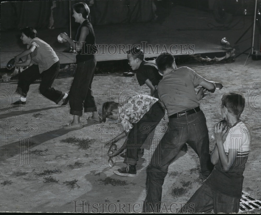 1955 Press Photo Children playing water balloon toss at McKinley playground - Historic Images