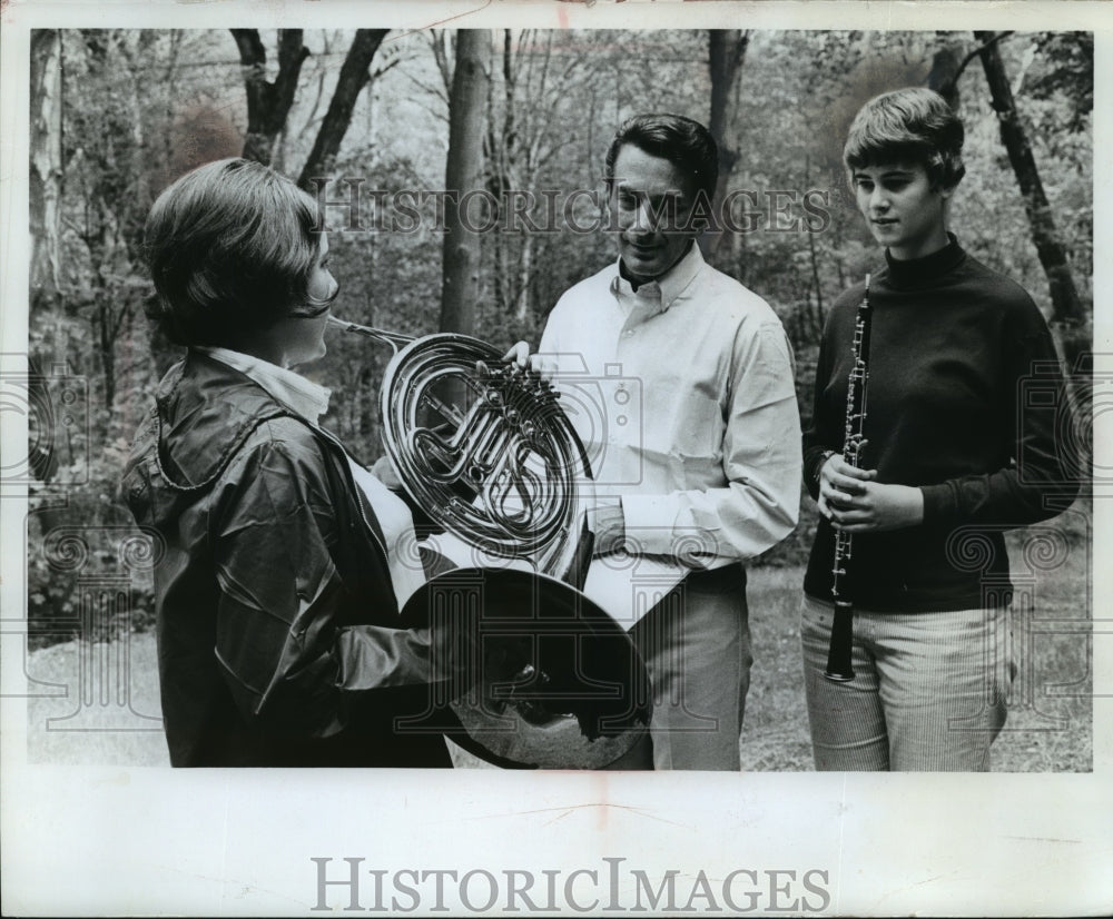 1968 Two girls receiving advice from Harry John Brown, New York-Historic Images