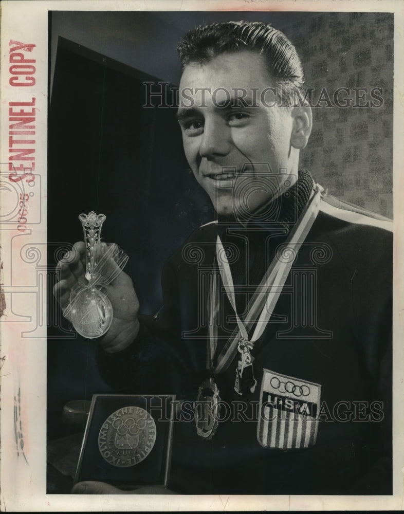 1964 Press Photo Wayne Le Bombard didn&#39;t go home empty handed from Olympics - Historic Images