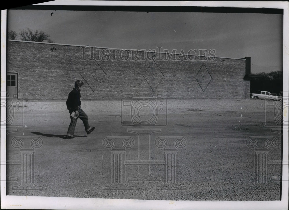 1958 Press Photo Billy Skipping Along Back to Father&#39;s Shop - mja68531 - Historic Images