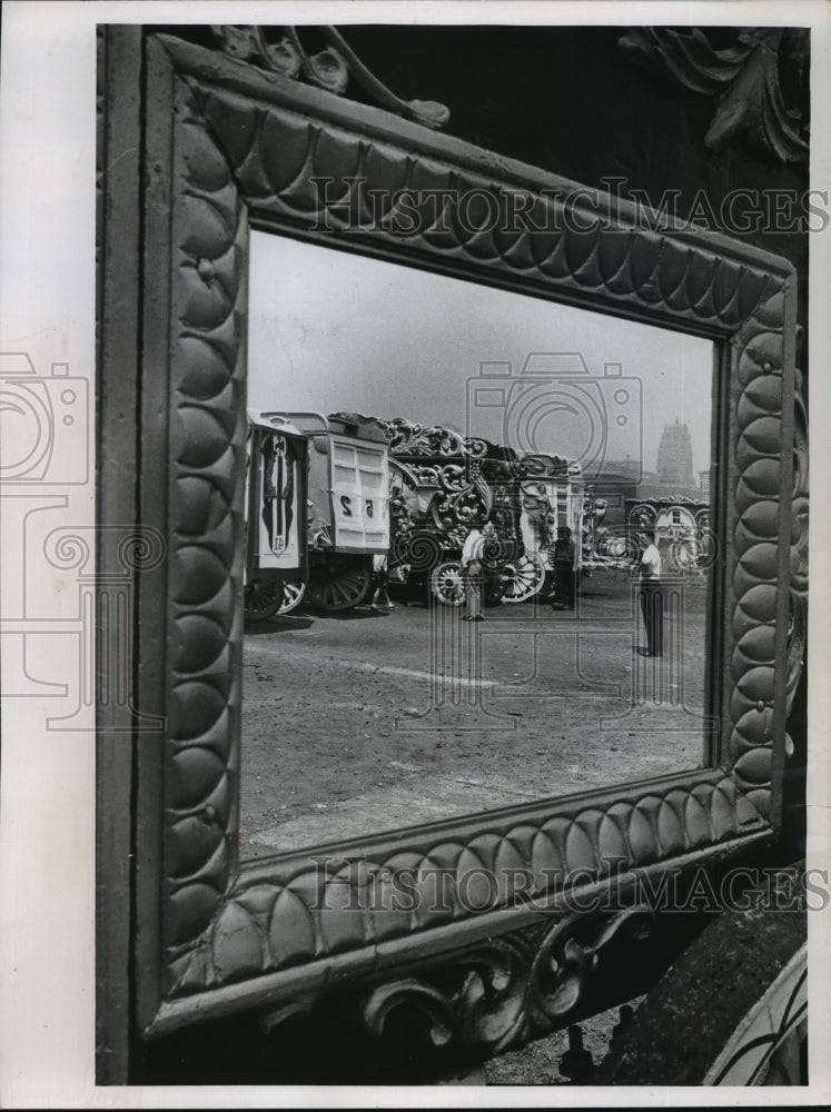 1963 Press Photo Colorful wagons on the scene were reflected in the mirror.-Historic Images