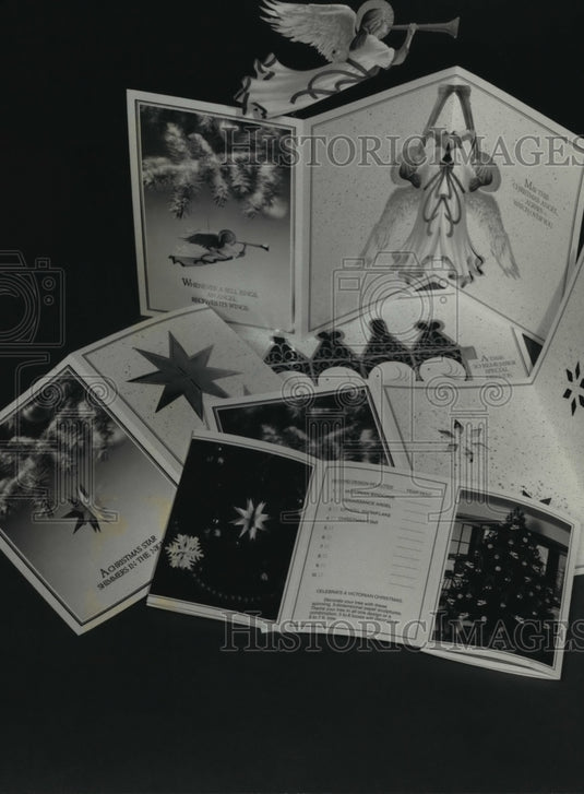 1990 Press Photo Christmas Cards and Angel Decoration - mja70308 - Historic Images