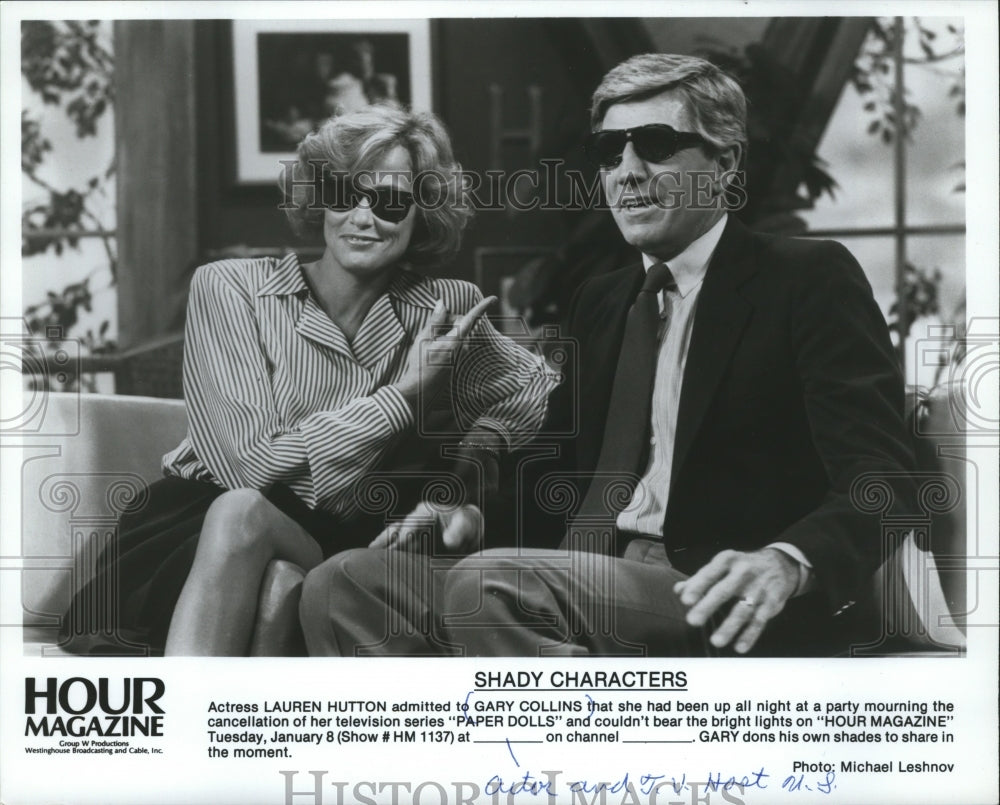 1984 Press Photo Gary Collins and Lauren Hutton wearing sunglasses in interview-Historic Images