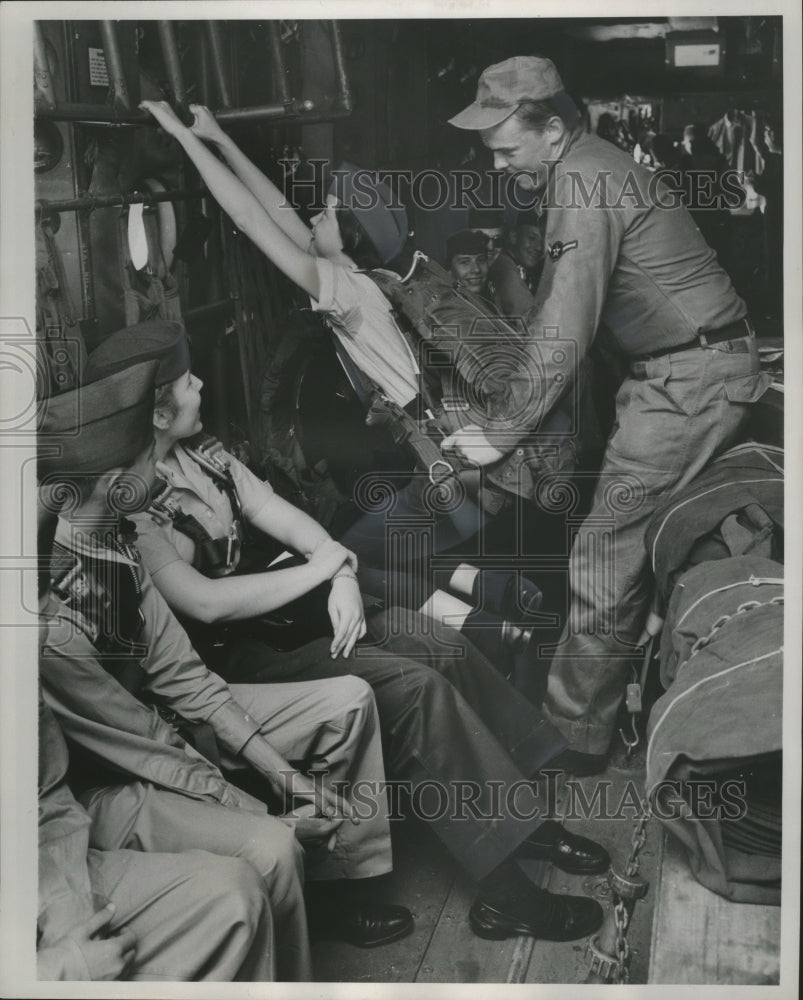 1958 Press Photo Civil Air Patrol Preparing to Parachute Out of Plane - Historic Images