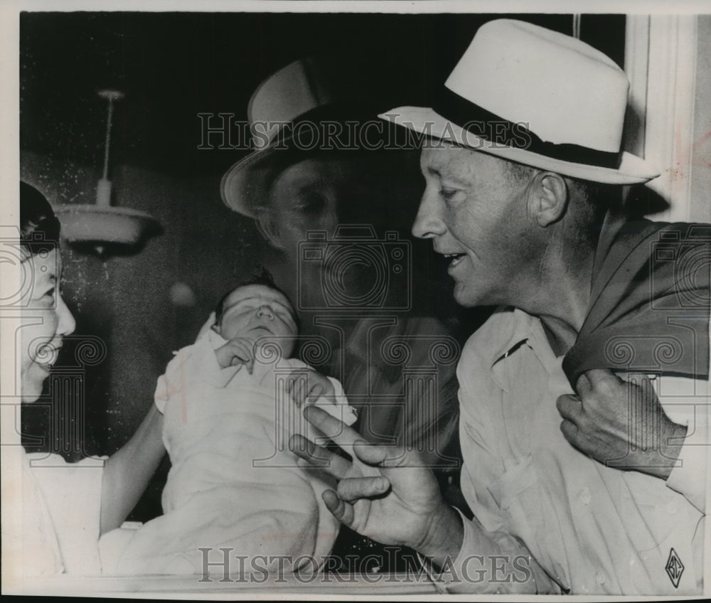 1958 Press Photo Bing Crosby poses for a photo with his newborn son - mja76752- Historic Images