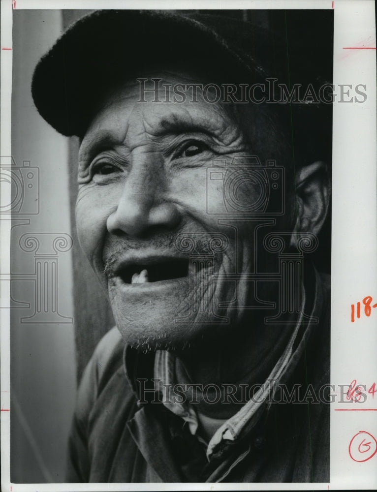 1979 Press Photo Smiling toothless Chinese man - mja77049 - Historic Images