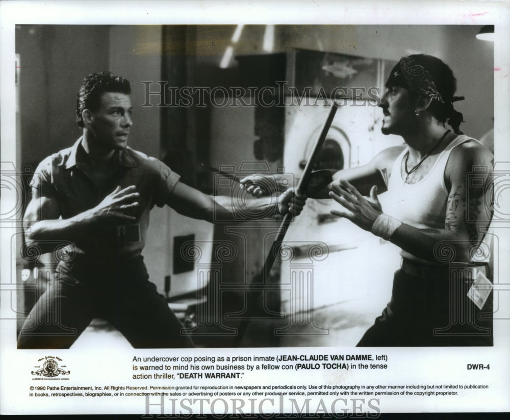 1991 Press Photo Jean-Claude Van Damme and Paulo Tocha in &quot;Death Warrant&quot; - Historic Images