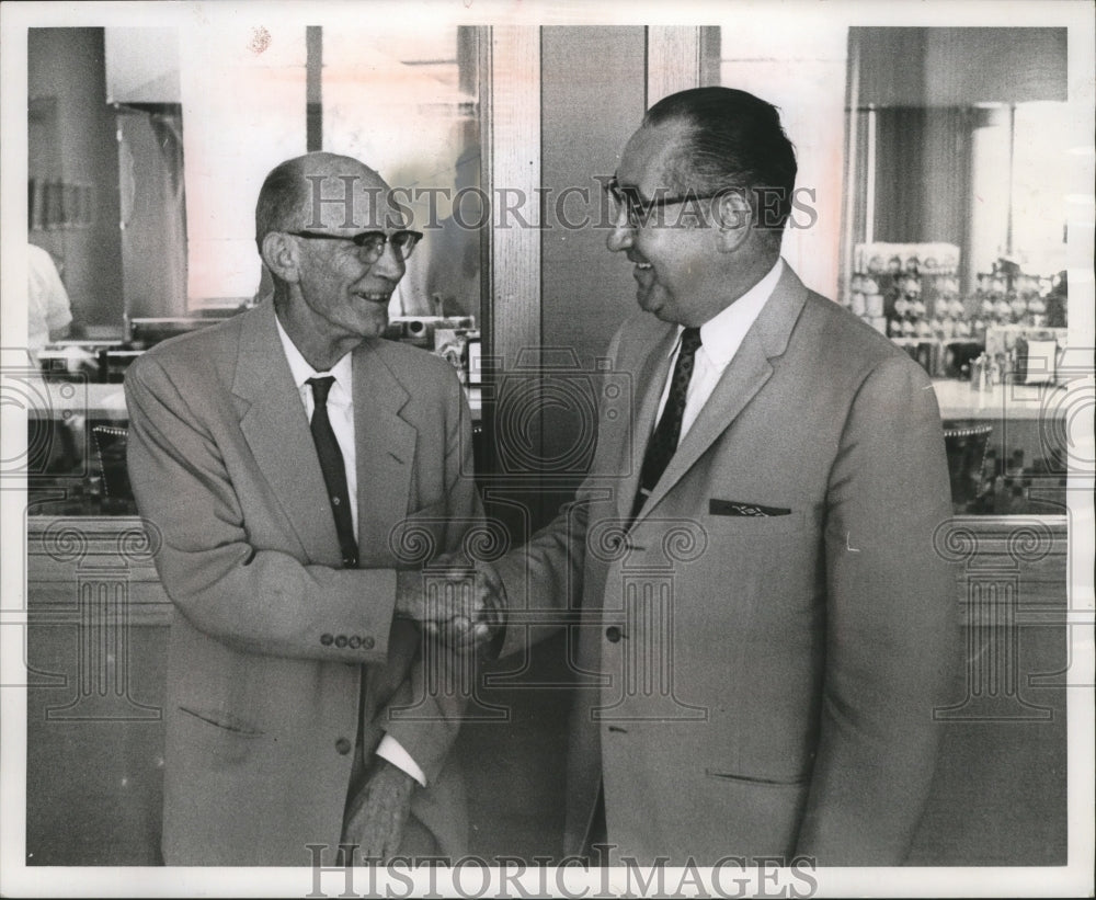 1962 Lyman C. Conger shakes hands in agreement with Emil Mazey,-Historic Images