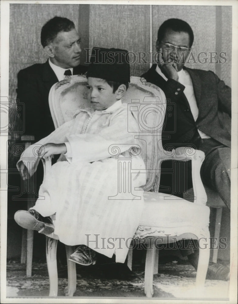 1967 Press Photo Crown Prince Sidi Mohammed sits during a housing inauguration - Historic Images