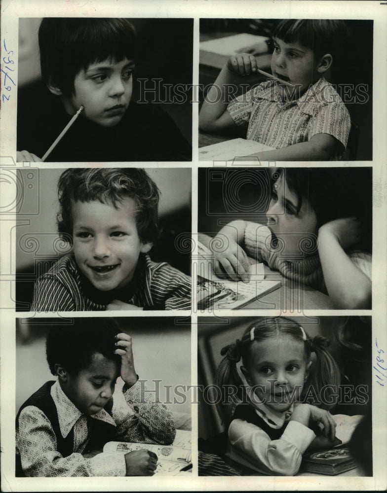 1975 Press Photo First graders yawn, smile, and concentrate while taking IQ Test - Historic Images