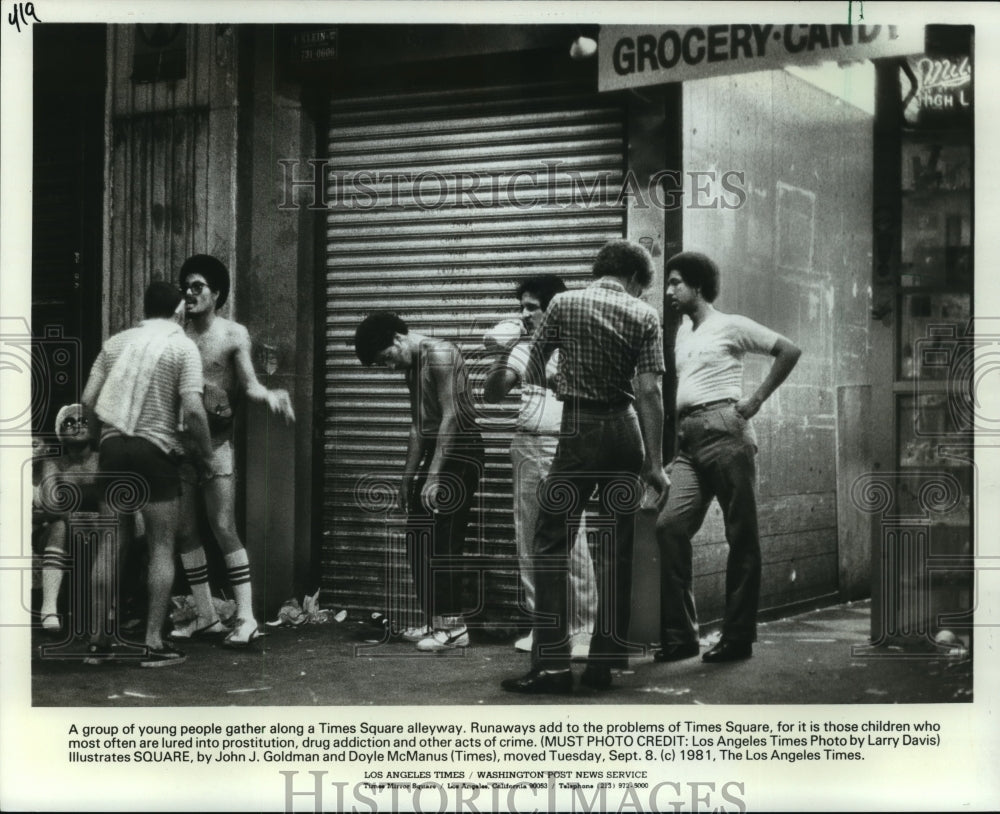 1981 Young people in the alley way in New York Times Square-Historic Images