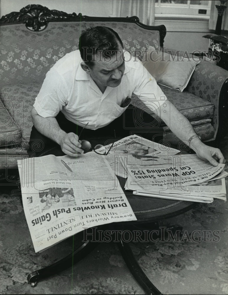 1963 Press Photo Congressman Clement Zablocki caught up on home town news. - Historic Images