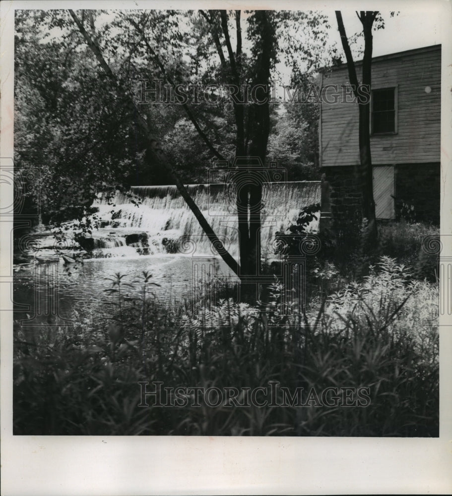 1966 Press Photo Waterfall and old grist mill in Merrillan, Wisconsin - Historic Images