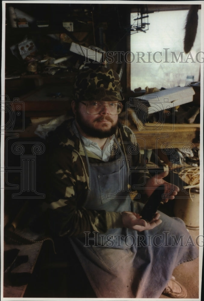 1992 Press Photo Arthur Boehm displays a Stone Age replica at his workshop-Historic Images