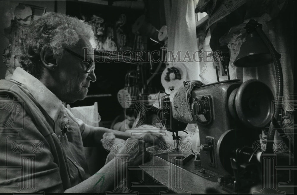 1983 Press Photo Ann Pekrul sewing a dress for a Shirley Temple doll - mja87179 - Historic Images