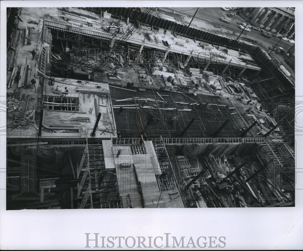 1960 Press Photo Workers and wooden planks inside building construction site - Historic Images