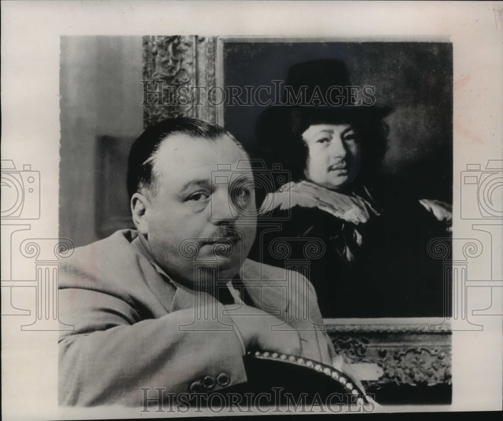 1951 Press Photo Michael DiSalle poses next to "Portrait of a Young Man"-Historic Images