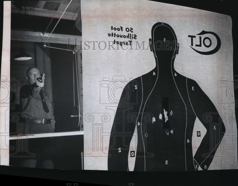 1964 Sgt. Eugene Lutomski participates in sheriff&#39;s dept shooting - Historic Images
