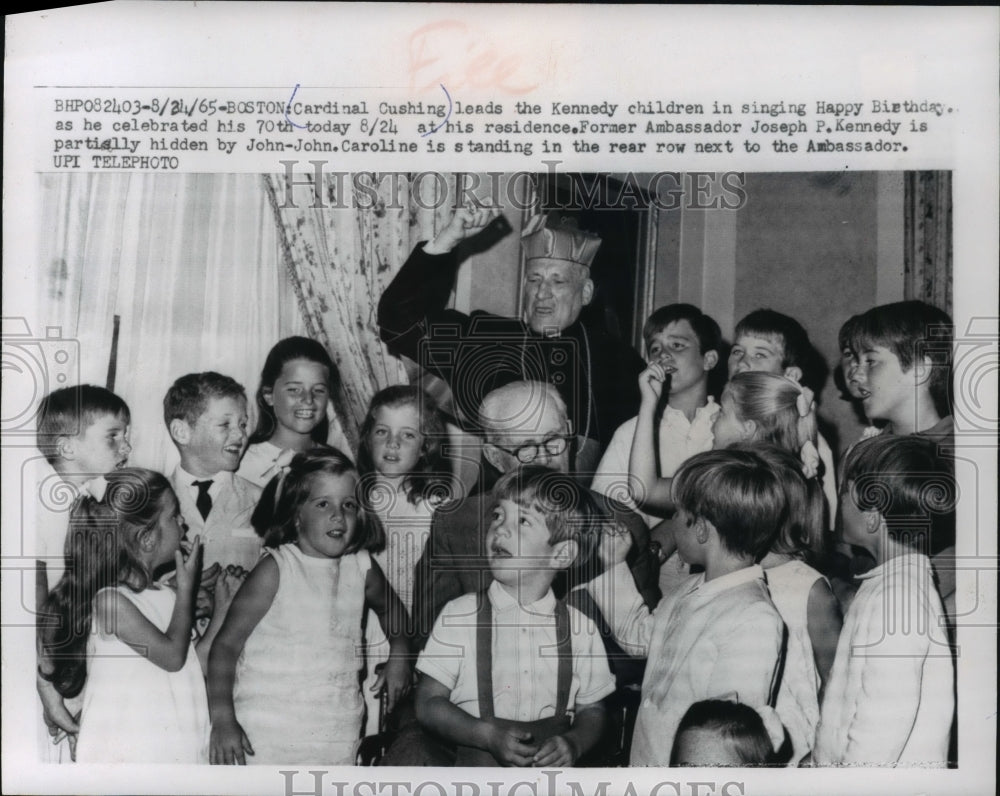 1965 Press Photo Cardinal Cushing and kids sing Happy Birthday to Joseph Kennedy - Historic Images