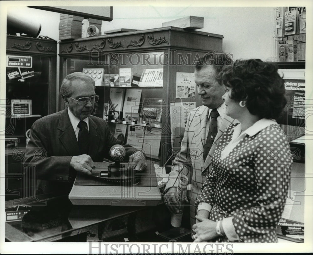 1983 Dark Room, Inc. Executives Examine Typesetting Equipment-Historic Images