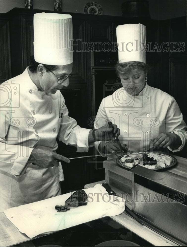 1988 Louie and Lusa Danegelis of Lee John&#39;s Catering Working on Meal - Historic Images