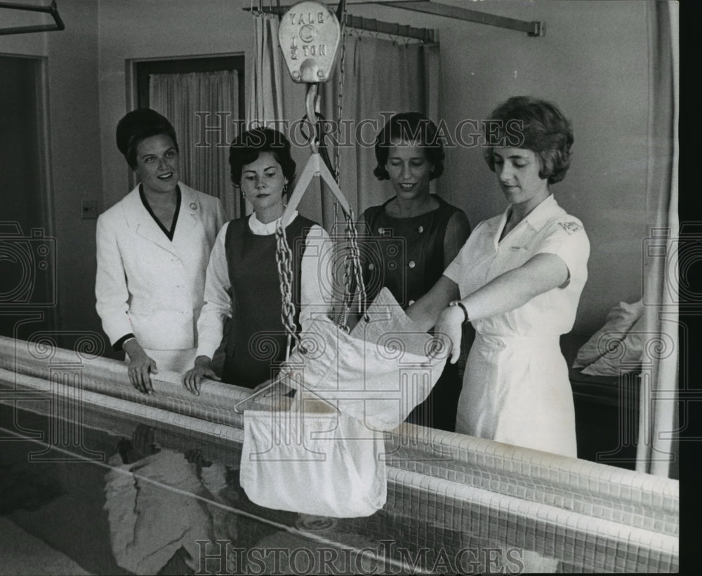 1964 Press Photo Therapist at Curative Workshop gives tour of facility to gorup - Historic Images