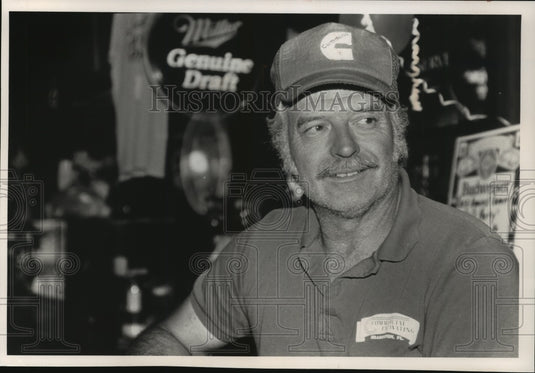 1992 Buss, a citizen of Delafield, Wisconsin poses for photo-Historic Images