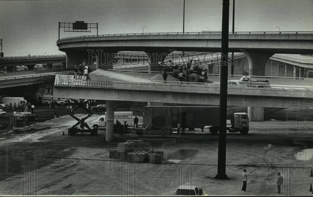 1979 Machinery prepares crash scene for film near Summerfest grounds - Historic Images
