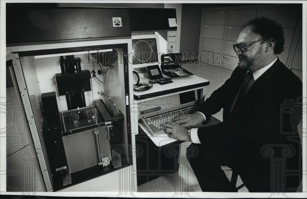 1990 Press Photo Charles Auclair, Stereo lithography machine, Digital photo Inc - Historic Images