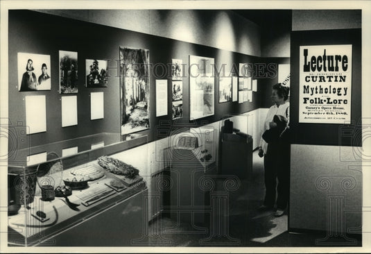 1987 Mavis Sticks at Jeremiah Curtin exhibit at Historical Society - Historic Images
