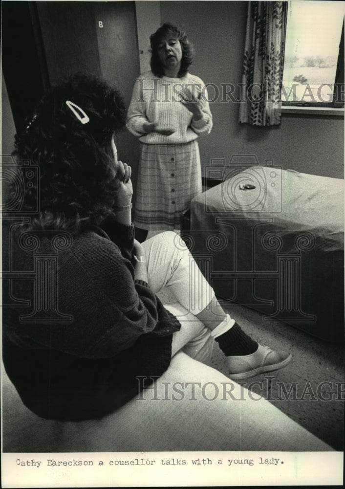 1988 Cathy Eareckson counsels a patient, DePaul Rehabilitation Hosp. - Historic Images