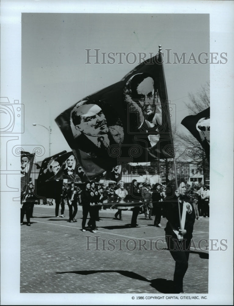 1986 Abraham Lincoln and Lenin saluted as great leaders in &quot;Amerika&quot; - Historic Images