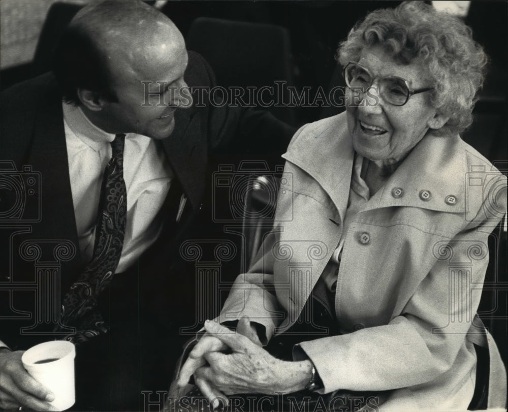 1992 John Galanis chats with Florence Eble who donated a park - Historic Images