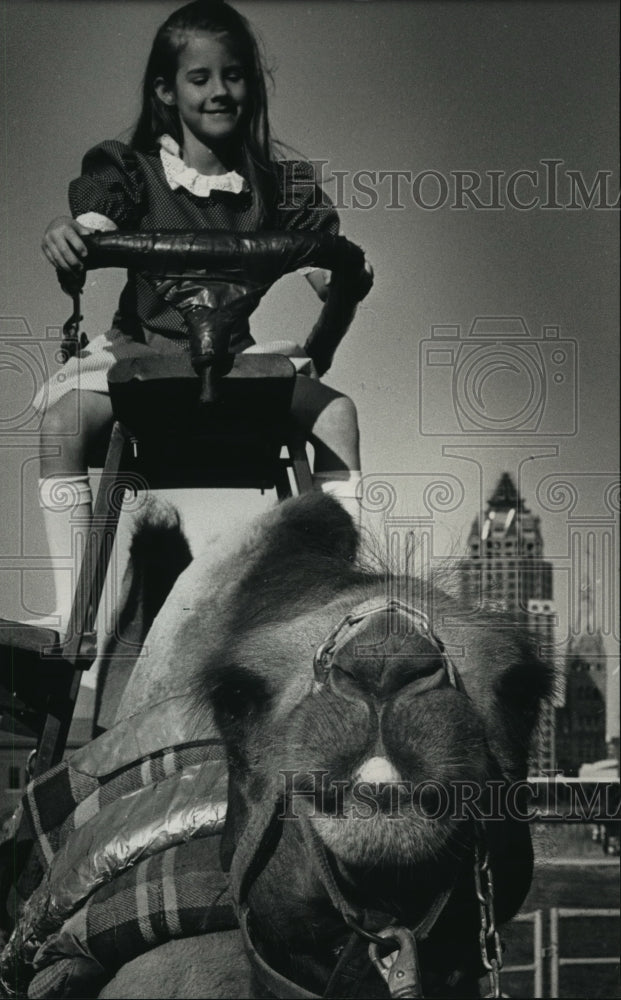 1988 Lydia Willoughby Rides a Camel at Milwaukee Public Museum - Historic Images