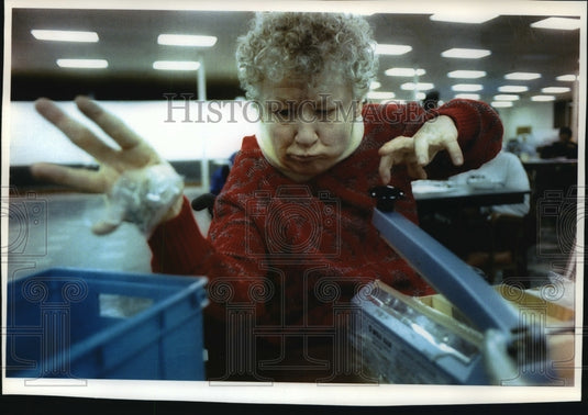 1994 Press Photo Chris Biersack Works Two Jobs to Make Ends Meet Without SSI - Historic Images