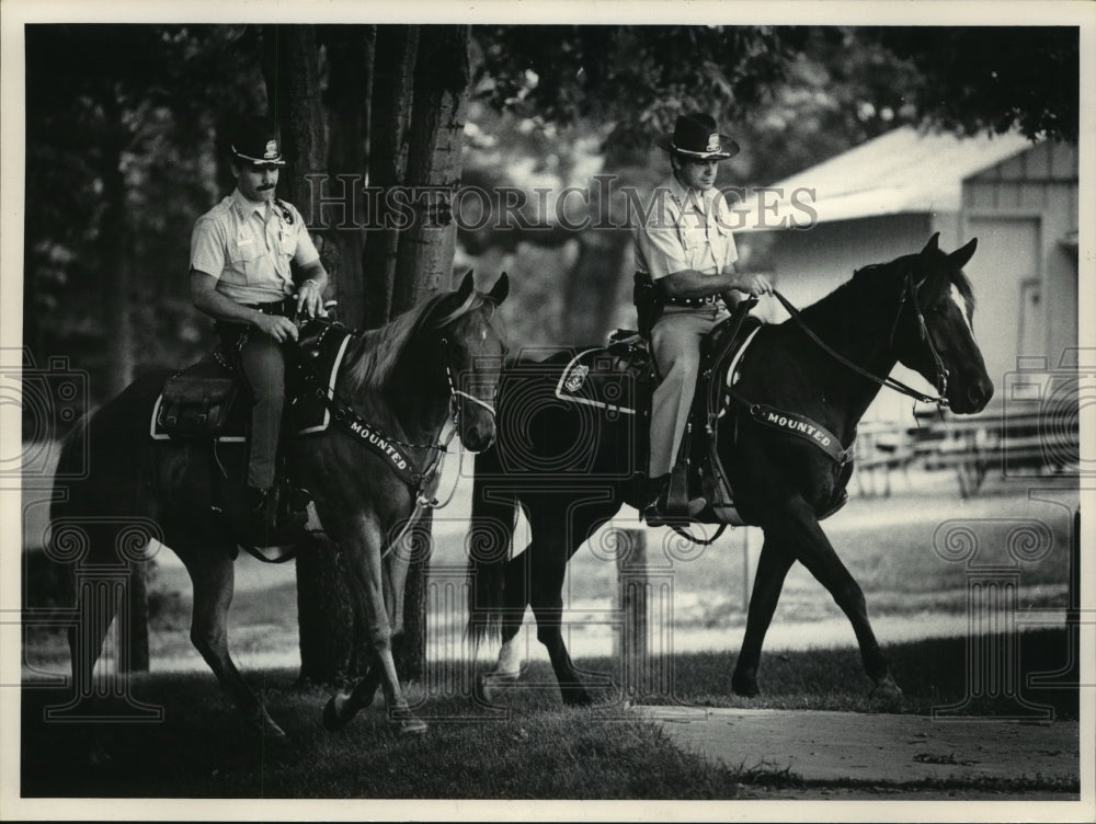 1984 Brookfield, Wisconsin, police officers patrolling Wirth Park.-Historic Images