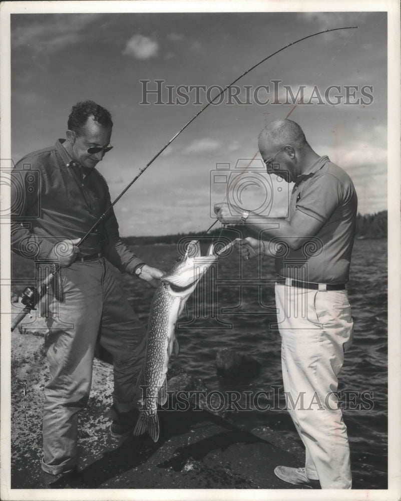 1961 Press Photo Series of pictures of fishing with Mel Ellis - mja99826- Historic Images